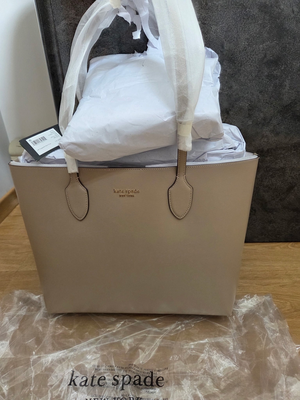 kate spade taupe leather tote with gold logo